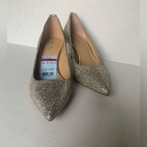 Michael Kors silver kitten heels.